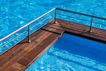 swimming pool in a complex with blue water