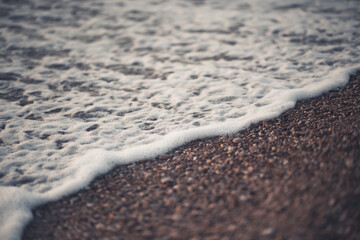 Background of dark sea waves with blur focus closeup.