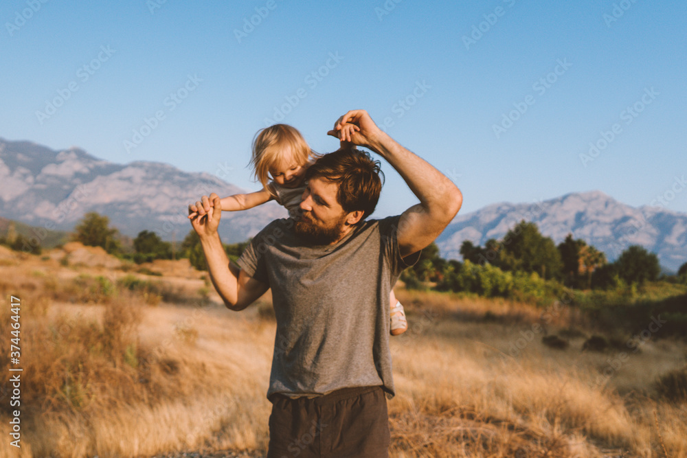 Wall mural family time father and child daughter playing together outdoor active healthy lifestyle vacations tr