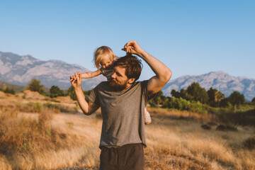 Family time father and child daughter playing together outdoor active healthy lifestyle vacations...