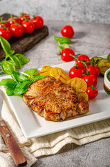 Delicious pork steak with herbs sauce