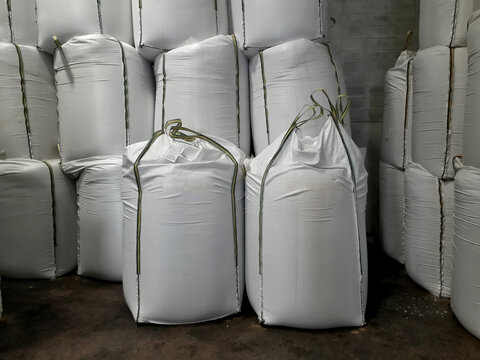 Stock pile Chemical fertilizer jumbo-bag in warehouse waiting for shipment.	
