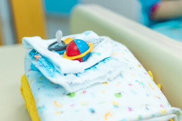 Baby pacifier close up shot. Newborn accessory. Childhood concept.