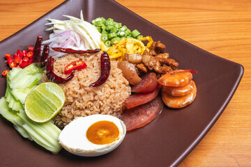 Rice mixed with shrimp paste in brown plate