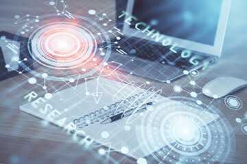 Double exposure of computer and technology theme hologram. Concept of freelance work.