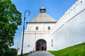 Pedestrian road leading toTaynitskaya (Secret) tower of Kremlin, Kazan, Russia. Writing on gates translates as 'Entrance' (in Russian)