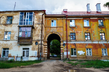 Facade of residential building built during early soviet era. Like many houses of Stalin epoch, it has a mandatory arch. Shot in Kazan, Russia