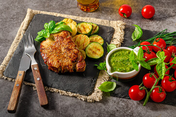 Delicious pork steak with herbs sauce