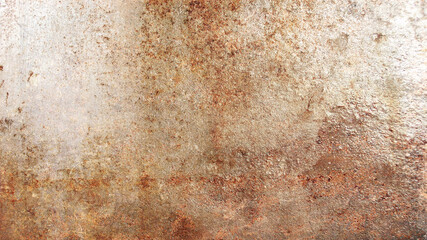 Brown peeling paint on the wall. Old concrete wall with cracked flaking paint. Weathered rough painted surface with patterns of cracks and peeling. High resolution texture for background and design.