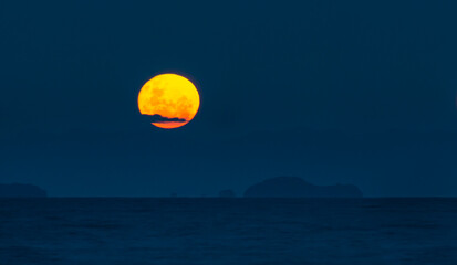 Supermoon rising above Auckland. Image taken at Milford beach in North Shore.