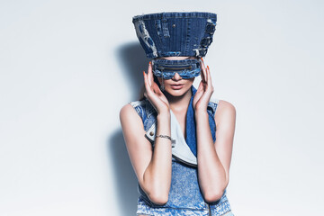 fashionable woman in blue denim hat