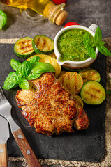 Delicious pork steak with herbs sauce
