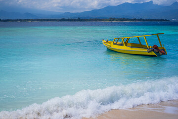 tropical beach with yellow boat