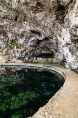 Grotta Di Sperlonga - A huge cave with the remains of a pool and a fountain from the grotto offers a magnificent view of the village of Sperlonga,Italy