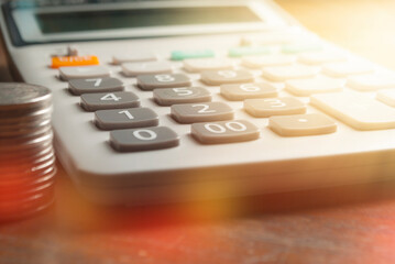 Financial accounting, money calculator on table