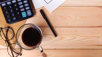 Financial accounting, money calculator on table