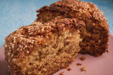 Slices of homemade sponge cake with cinnamon and sesame.