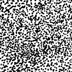 Abstract black and white dots, brush strokes, ink splaters seamless pattern