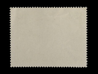 Fototapeta premium Blank old postage stamp isolated on black background, with clipping path