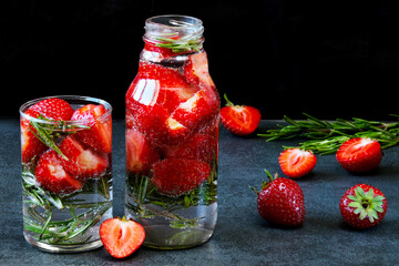 Strawberry detox drink with rosemary. Refreshing cocktail.