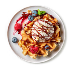 belgian waffle with ice cream and fresh berries