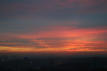 
Natural Sunset Sunrise Over Field Or Meadow. Bright Dramatic Sky And Dark Ground. Countryside Landscape Under Scenic Colorful Sky At Sunset Dawn Sunrise. Sun Over Skyline, Horizon. Warm Colours.