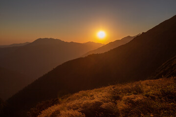 Sunset in the mountains a scenic natural landscape
