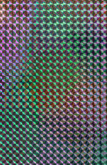 glitter pattern background, silver rainbow holographic foil texture, colorful hologram surface.
