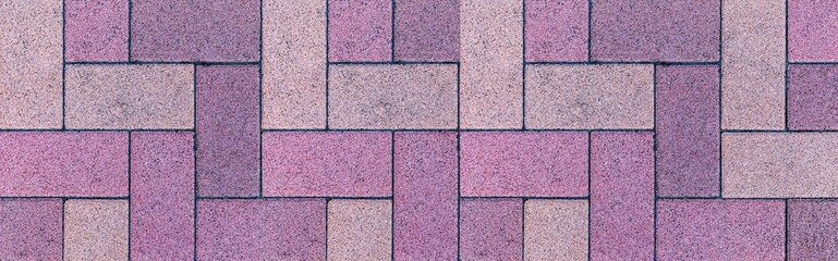 Panorama of Vintage purple cobblestone pavement pattern and background