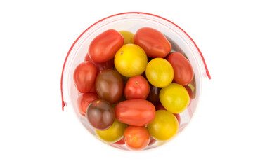 colorful small tomatos - red, green, yellow, dark