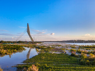 Signature Bridge is a cantilever spar cable-stayed bridge which spans the Yamuna river at Wazirabad section, connecting Wazirabad to East Delhi.
