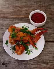 Plate of fried chicken wings.