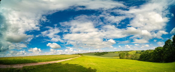 Wide Panorama  Landscape in Germany in the Summer with blue sky and sun shine.