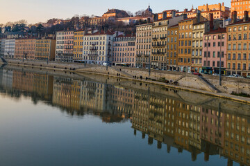 Cityscape of Lyon city by the river with building reflections on the water
