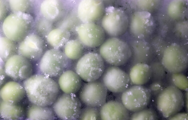 close-up detail of frozen organic peas
