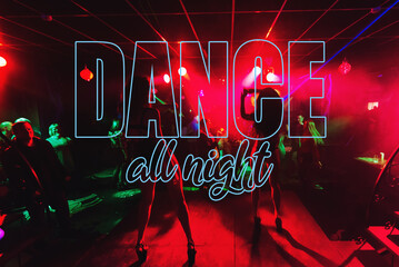 inscription Dance All Night on the background of blurred silhouettes of go-go dancers on stage