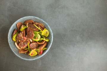 Spicy Chinese sausage salad mix with cucumber and vegetables. Thai called Yum-Kun-Chiang