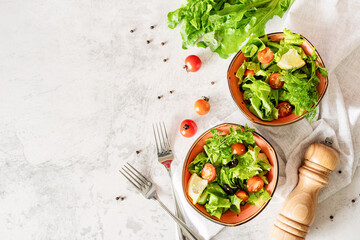 bowls of vegetable mixed salad top view flat lay