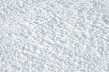 Abstract footprints on white snow as a background for any project Christmas
