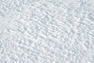Abstract footprints on white snow as a background for any project Christmas