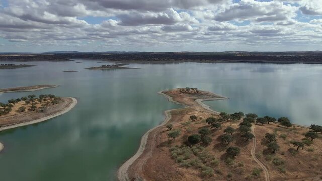 Aerial view of Alqueva Dam artificial Lake, near aldeia da luz river beach, Alentejo tourist destination region, Portugal.