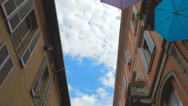Strada con ombrelli colorati a Pavia, Street with olorful umbrellas in Pavia 