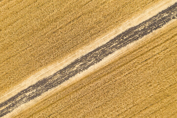 Countryside rural dirt road. Aerial view.