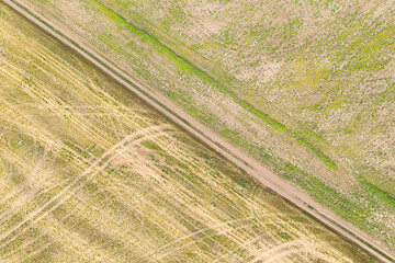 Countryside rural dirt road. Aerial view.