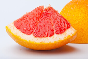 Grapefruit citrus fruit with half on white with clipping path