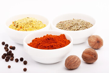 Composition with different spices on white background