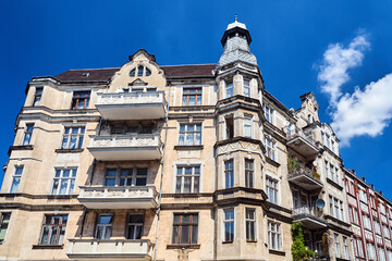 Fototapeta na wymiar Facades with balconies of historic tenement houses in the city of Poznan