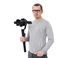 professional videographer with camera on gimbal stabilizer isolated on white