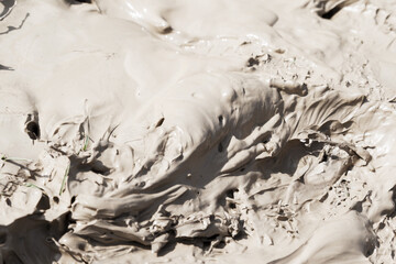 Texture of liquid clay. Photography. Selective focus. Outdoors