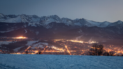 Dusk over illuminated zakopane in winter, aerial view © shaiith